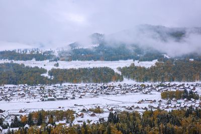 新疆北部秋色行摄之旅 —— 九月禾木 罕见雪天
